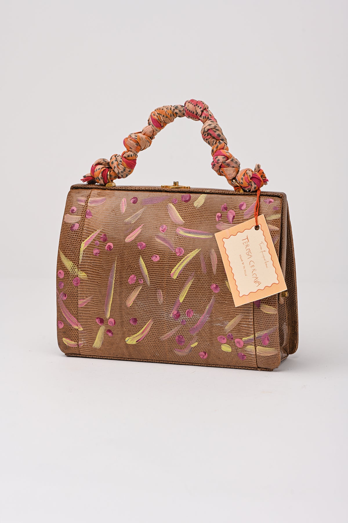 Borsetta dipinta a mano con manico intrecciato