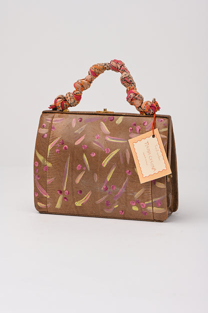 Borsetta dipinta a mano con manico intrecciato